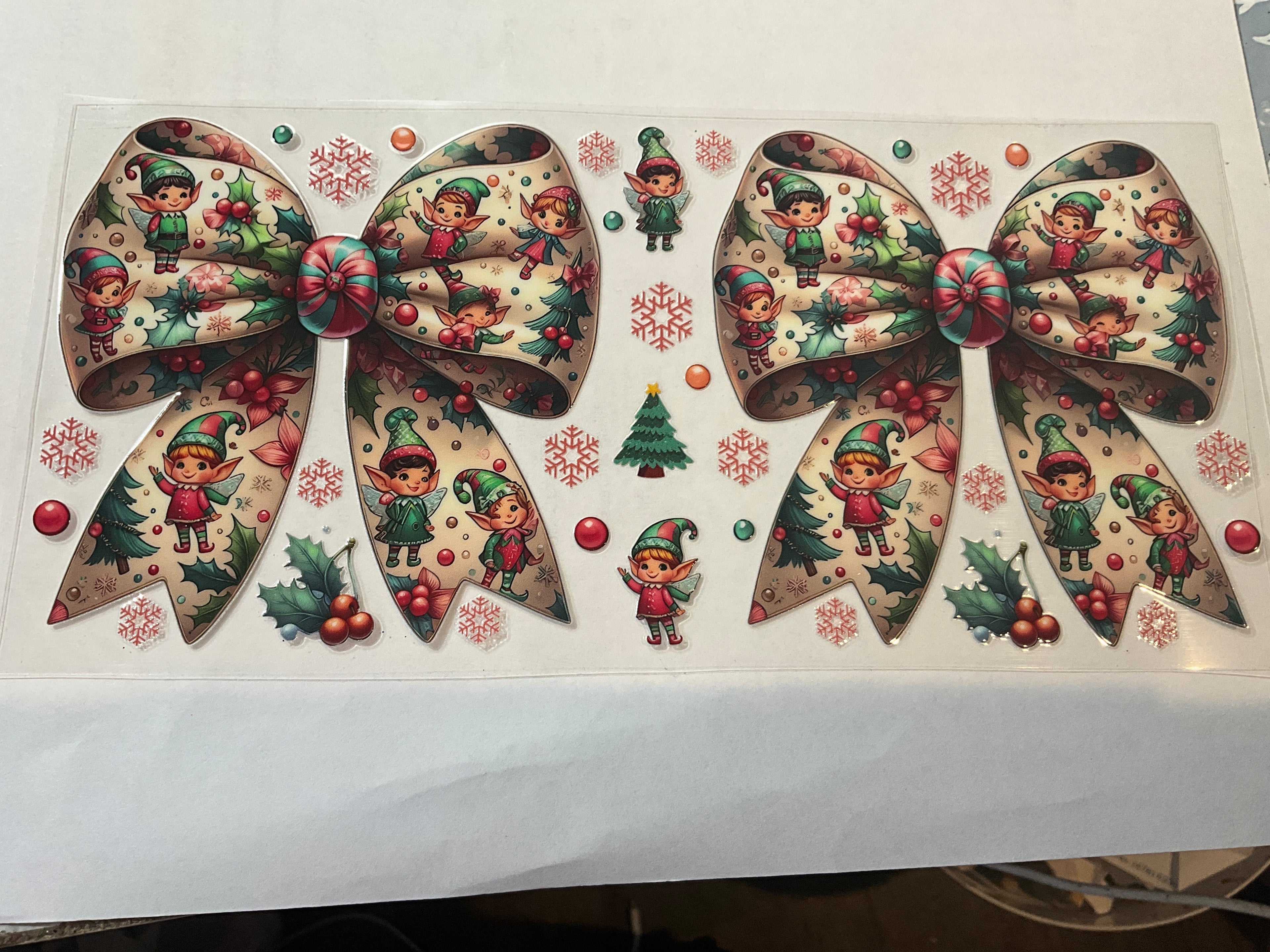 Elf, elves on big bow