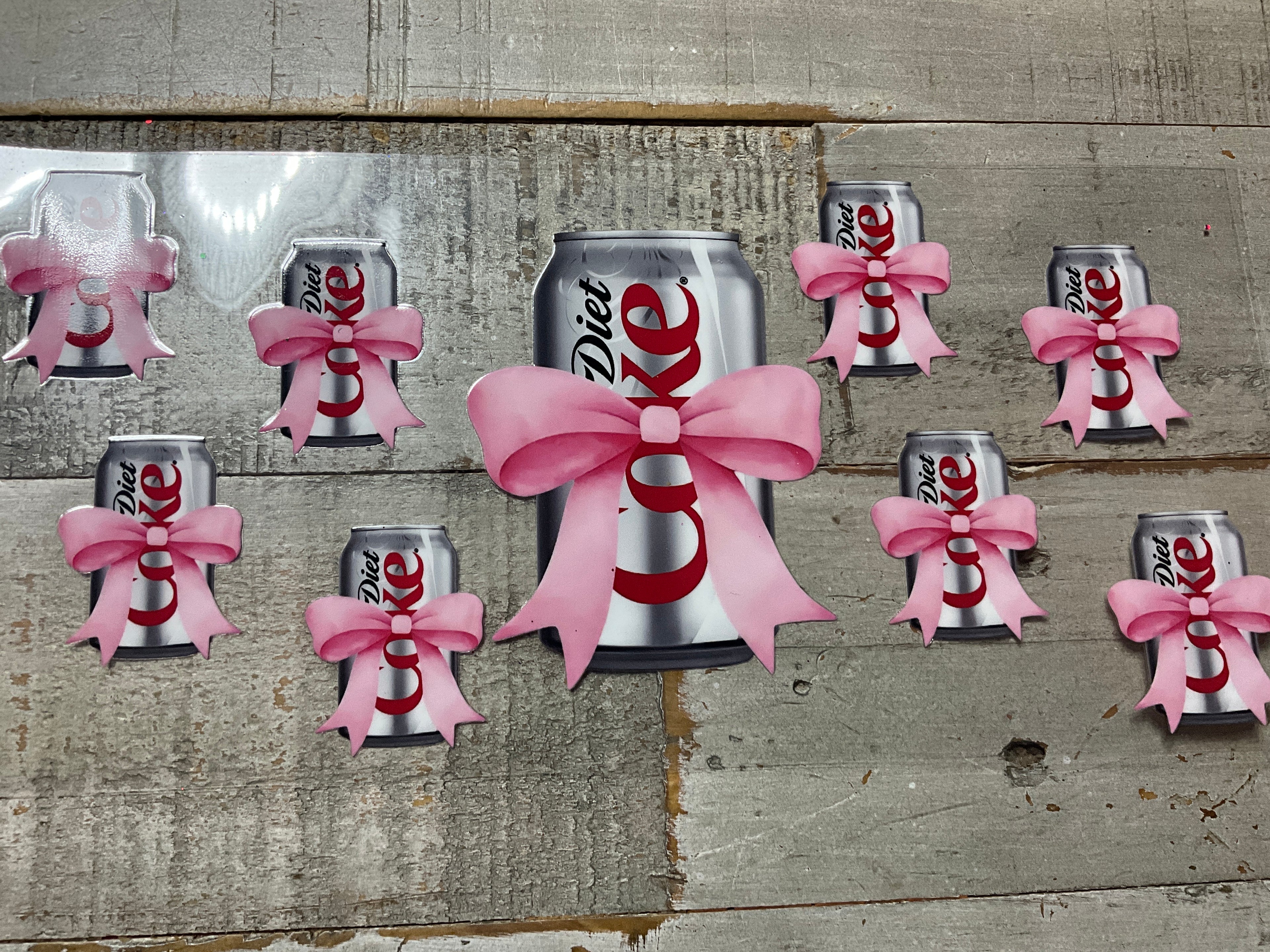 Pink bow Diet Coke