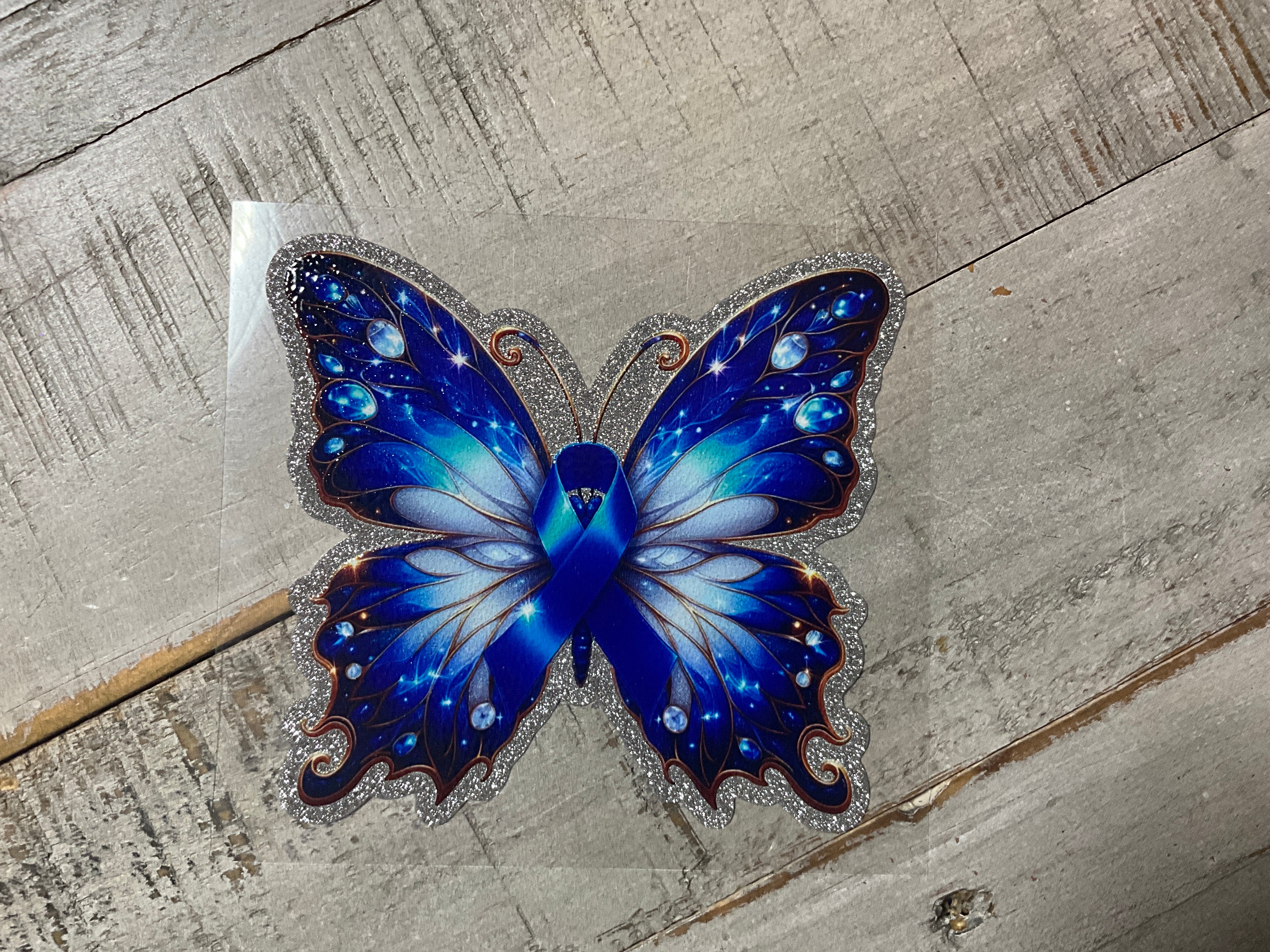 Blue ribbon butterfly glitter