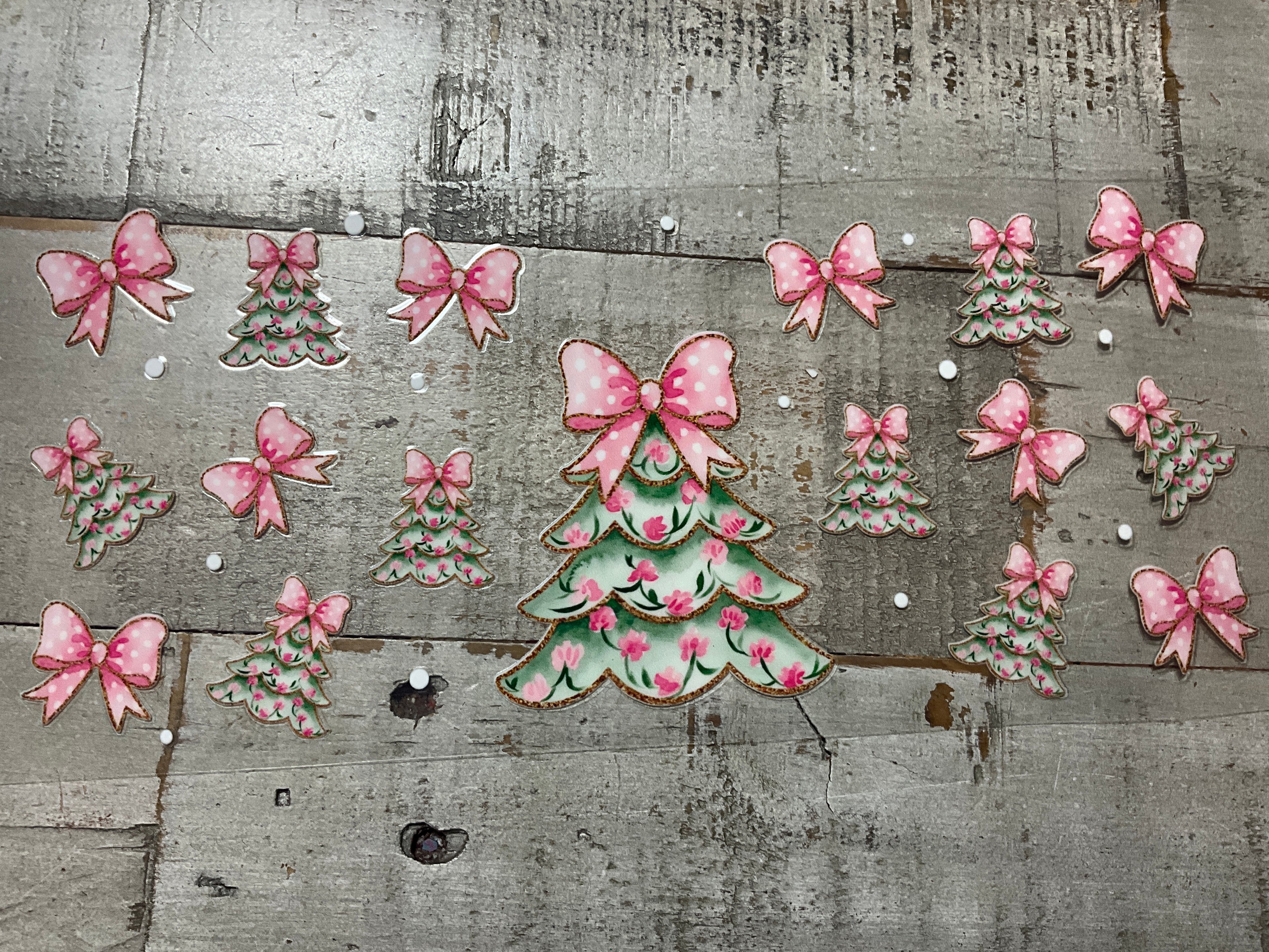 Green Christmas tree with pink bow